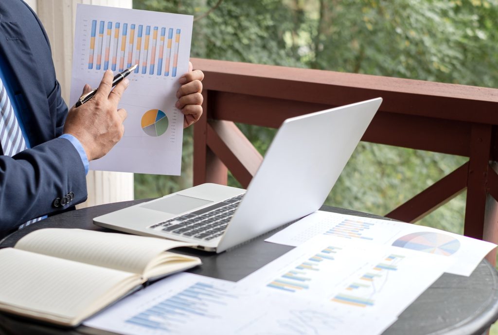 work from home, The hand of the businessman who works in finance at home and calculates financial